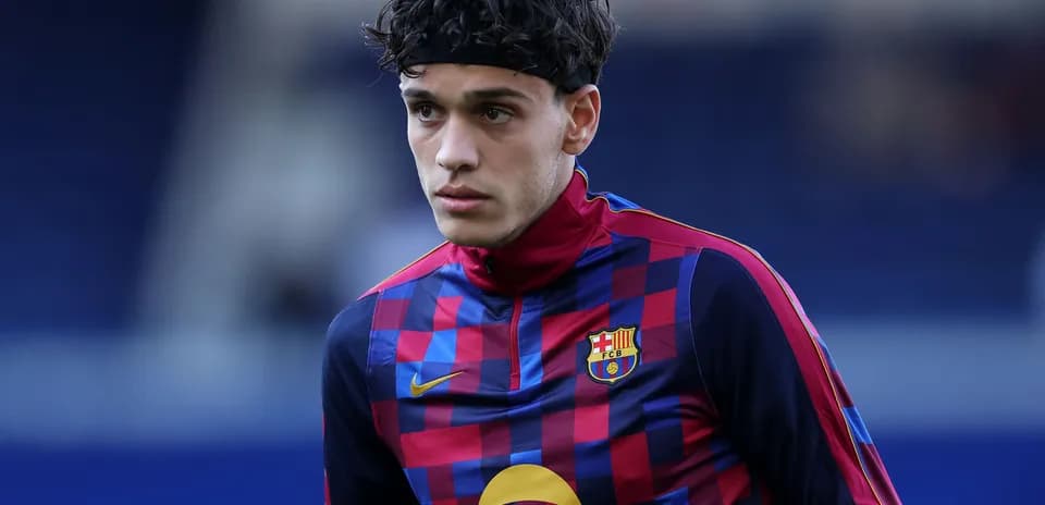 Player warming up in Barcelona training kit
