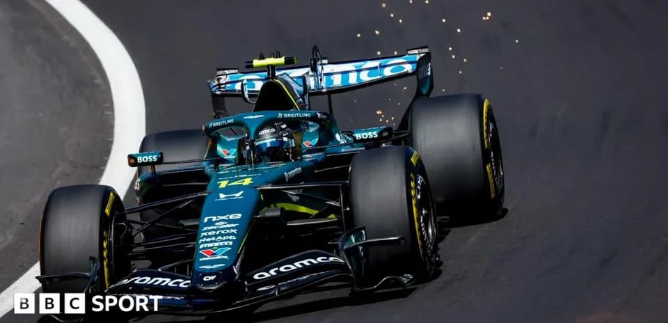 Car 14 racing on track with sparks flying