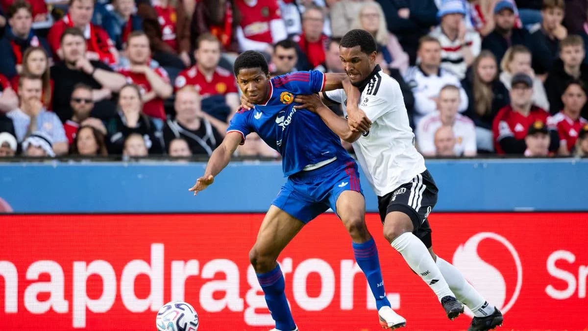 Two players contesting the ball during a match