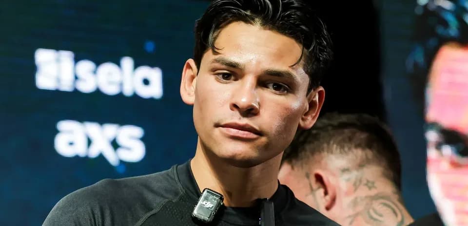 Boxer preparing for event with microphone attached