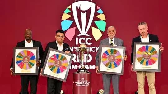 Four officials presenting awards at ICC World Cup event