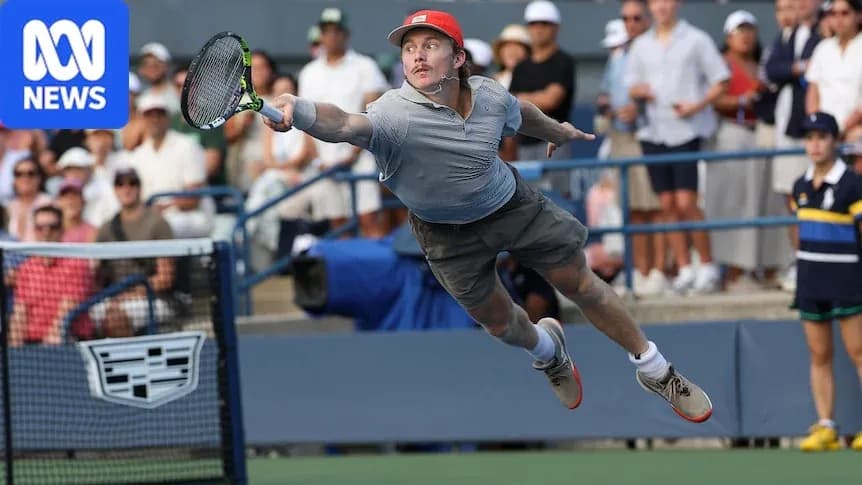 Player diving to hit a tennis ball during match