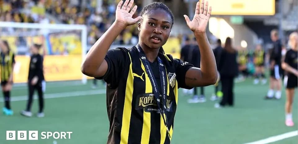 Player waving after a match in team uniform
