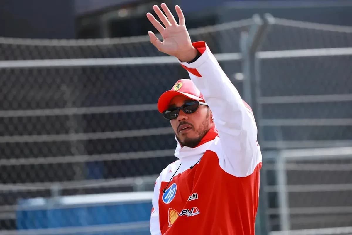 Driver waving during an event at the racetrack