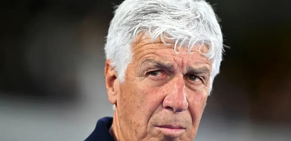 Coach with gray hair during match observation