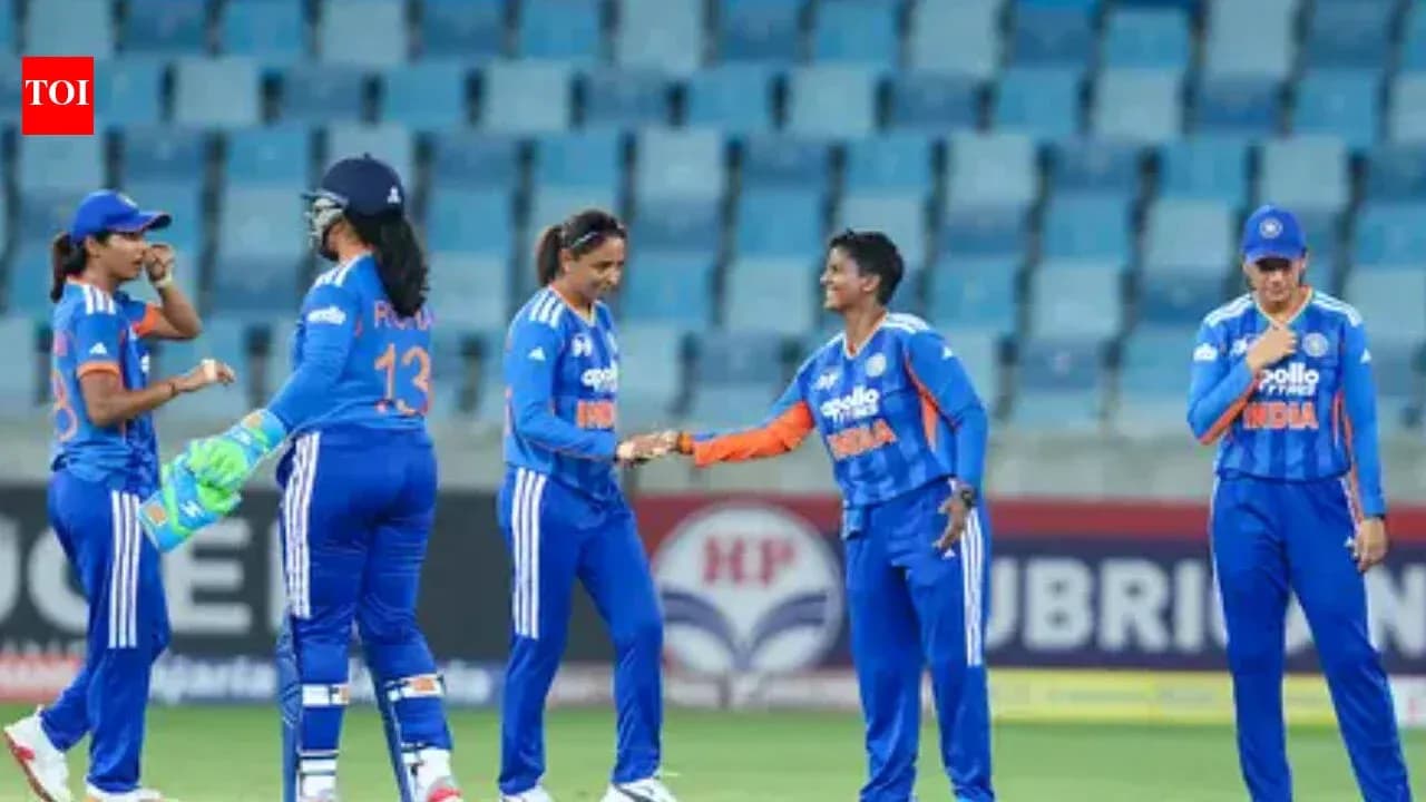 Indian women's cricket team celebrating on the field