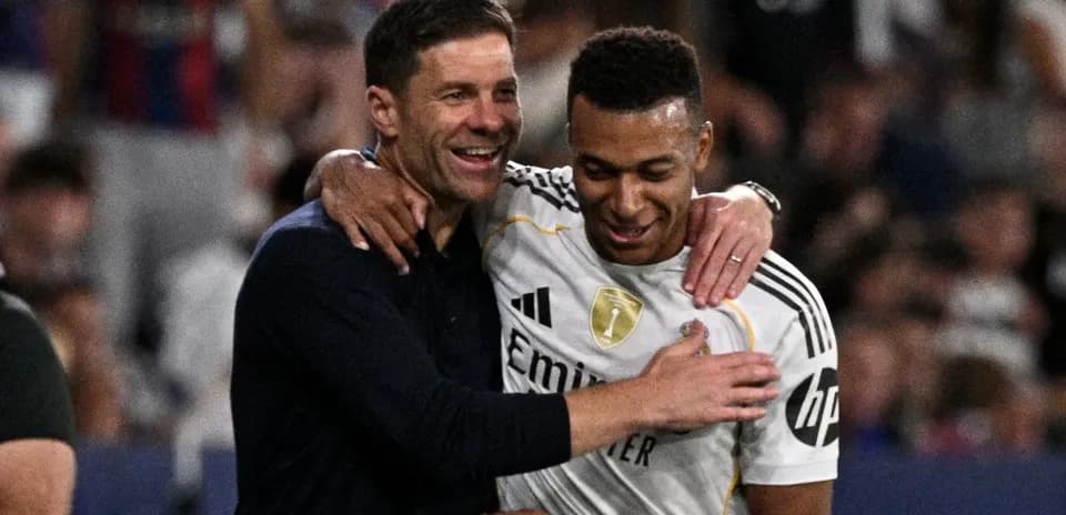 Coach and player celebrating after match victory
