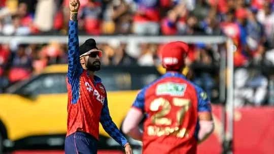 Bowler celebrating after taking a wicket during match