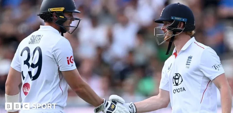 Two cricketers celebrating a run during match