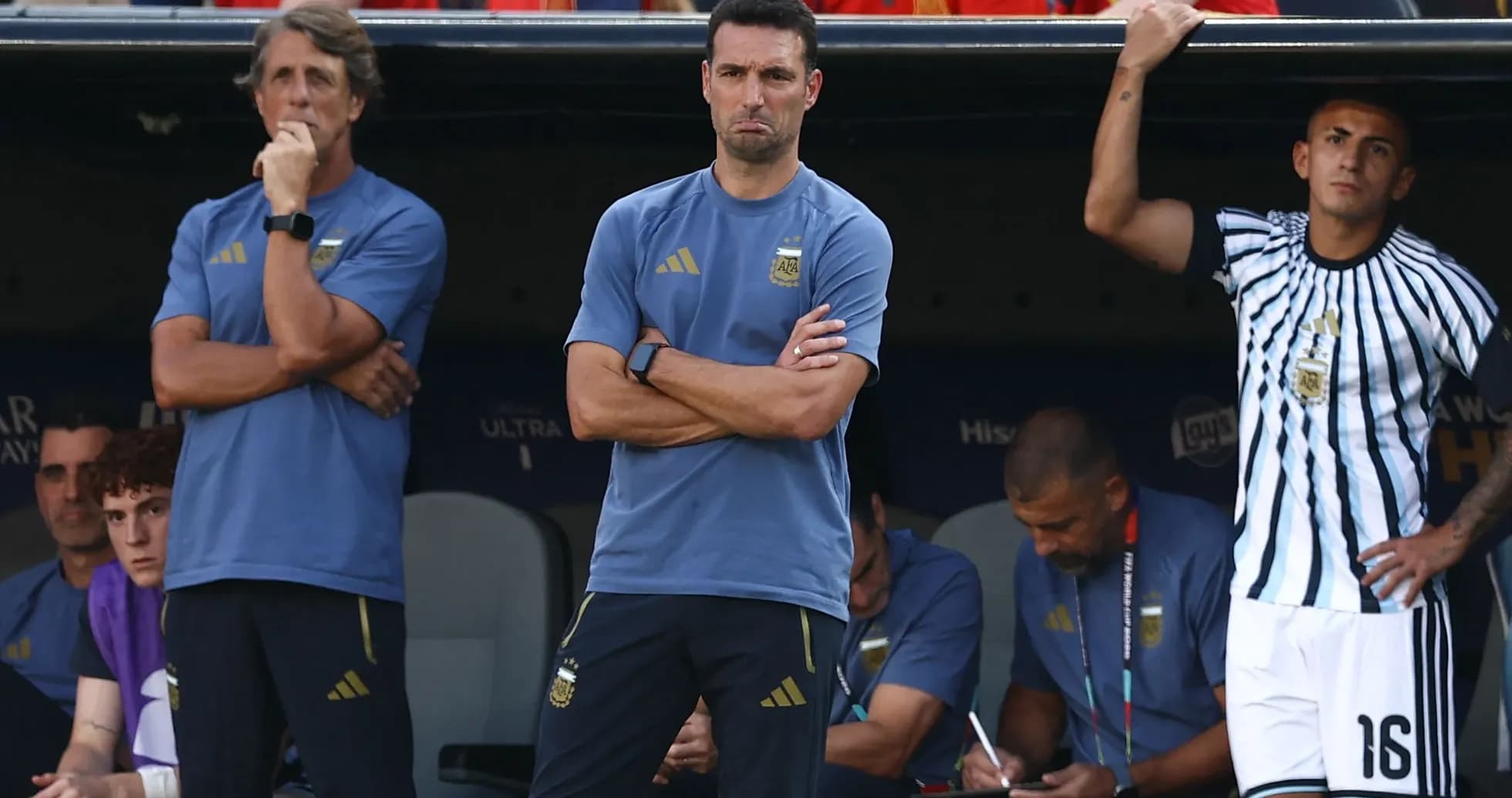 Coaches and players on Argentina's bench during match