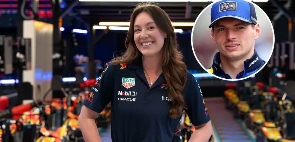 Team member posing in Red Bull Racing garage