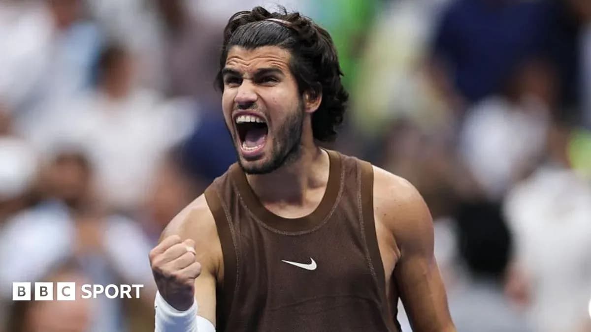 Tennis player celebrating victory with raised fist