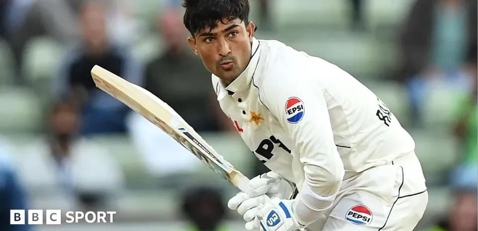 Batsman preparing to hit ball in cricket match