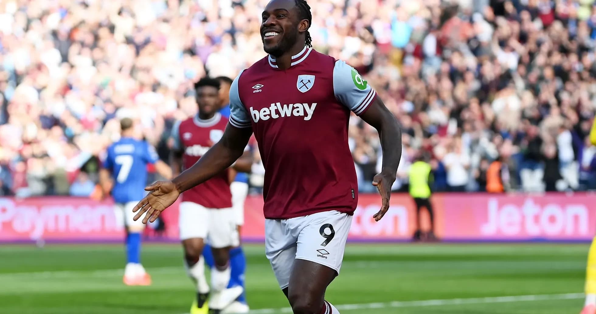 Player celebrating a goal in West Ham kit