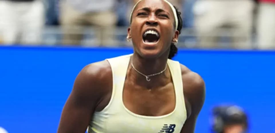 Tennis player celebrating a victory during match