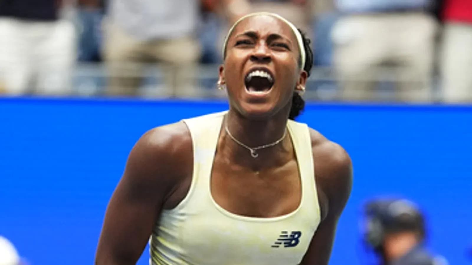 Tennis player celebrating a victory during match