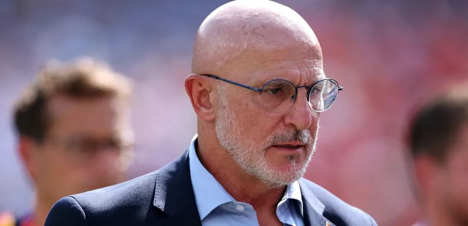 Man in glasses with a serious expression outdoors
