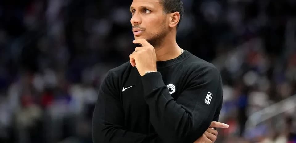 Coach observing the game from the sidelines
