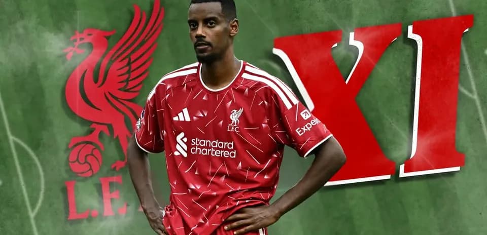 Player in Liverpool kit with club logo background