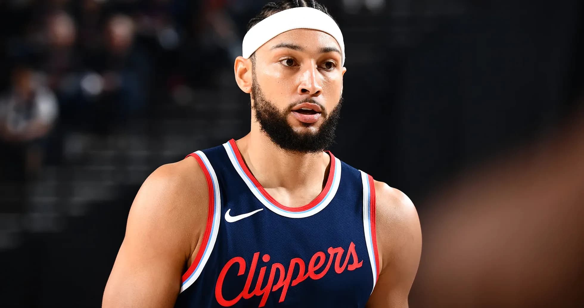 Basketball player wearing Clippers jersey during game