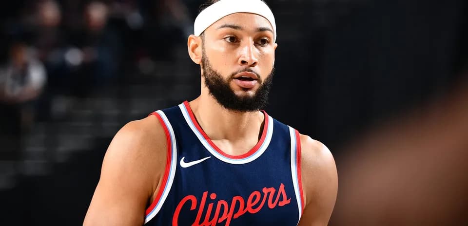 Basketball player wearing Clippers jersey during game