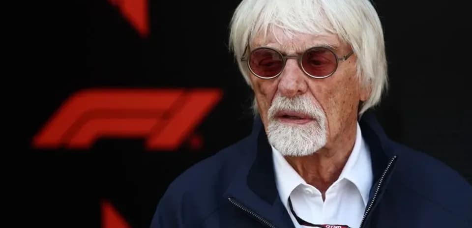 Elderly man with white hair and sunglasses