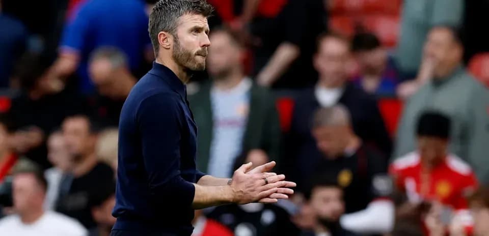 Manager clapping during match at stadium