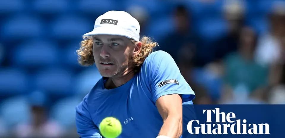 Tennis player preparing to hit a ball during match