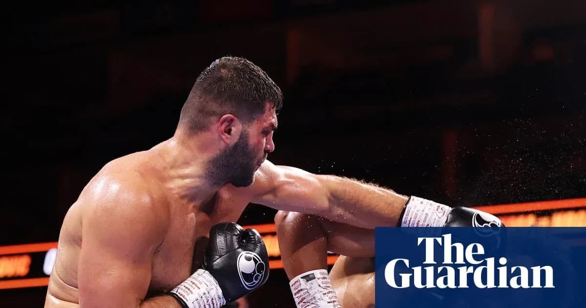 Boxer delivering a punch in the ring