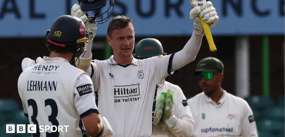Batsman celebrating after scoring a century in cricket match