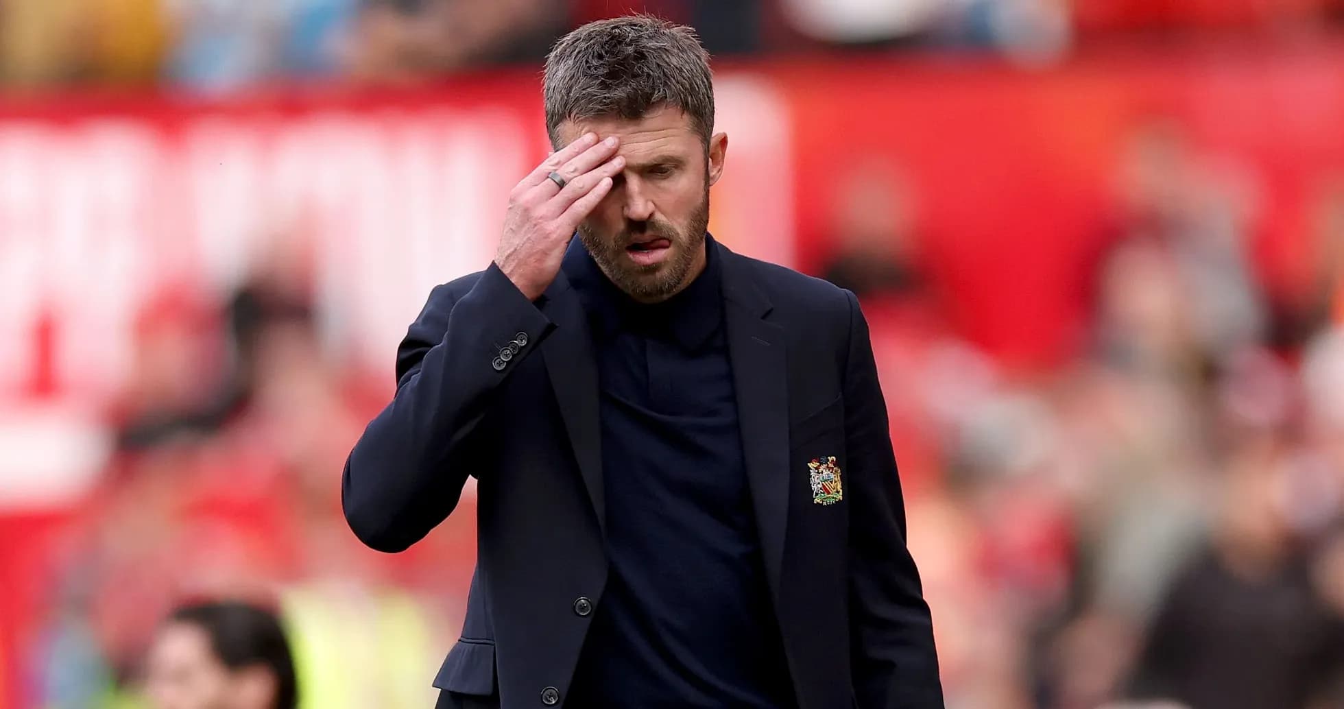 Coach walking on the sidelines during a match