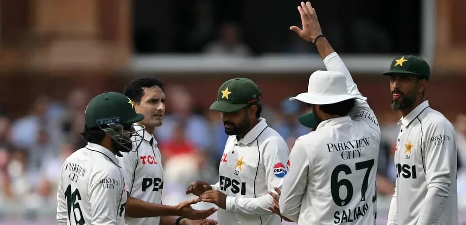 Pakistani cricket team celebrating a wicket on field
