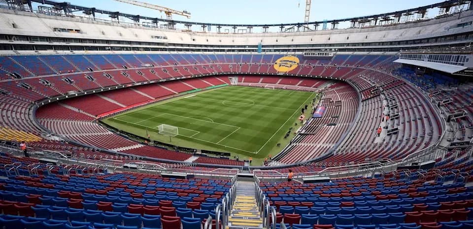 View of empty stadium with field and seating