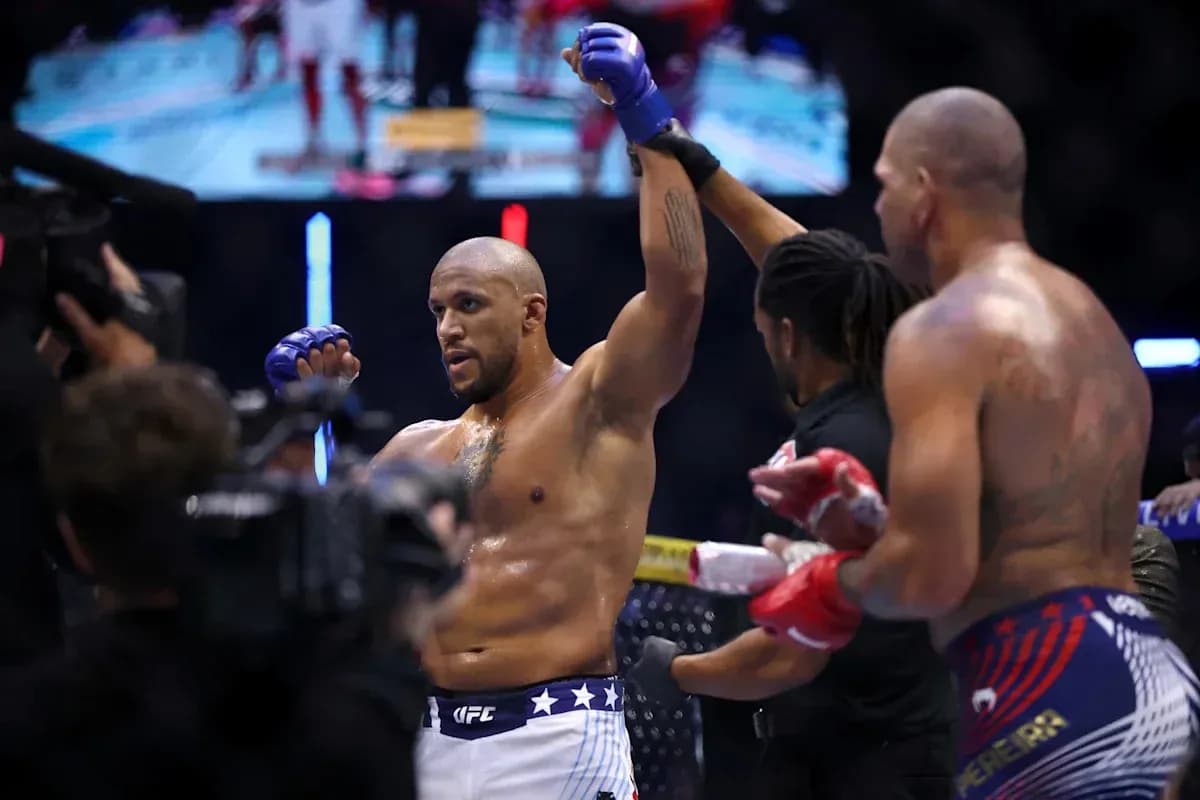 Fighter celebrating victory in the octagon