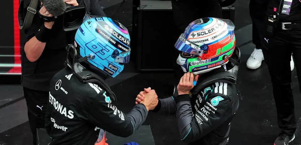 Two Formula 1 drivers shaking hands after race
