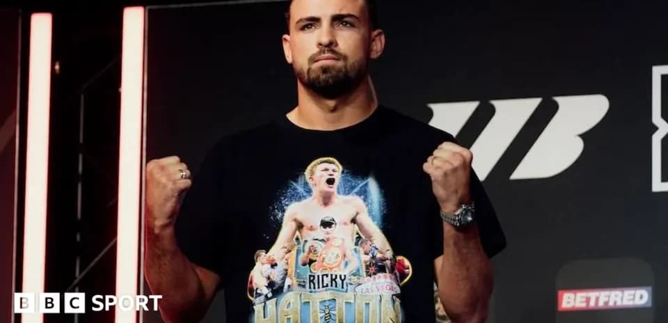 Boxer posing confidently at press conference event