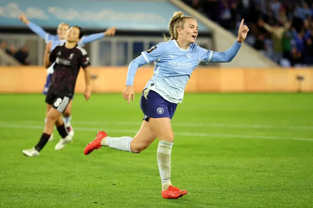 Player celebrating a goal on the pitch