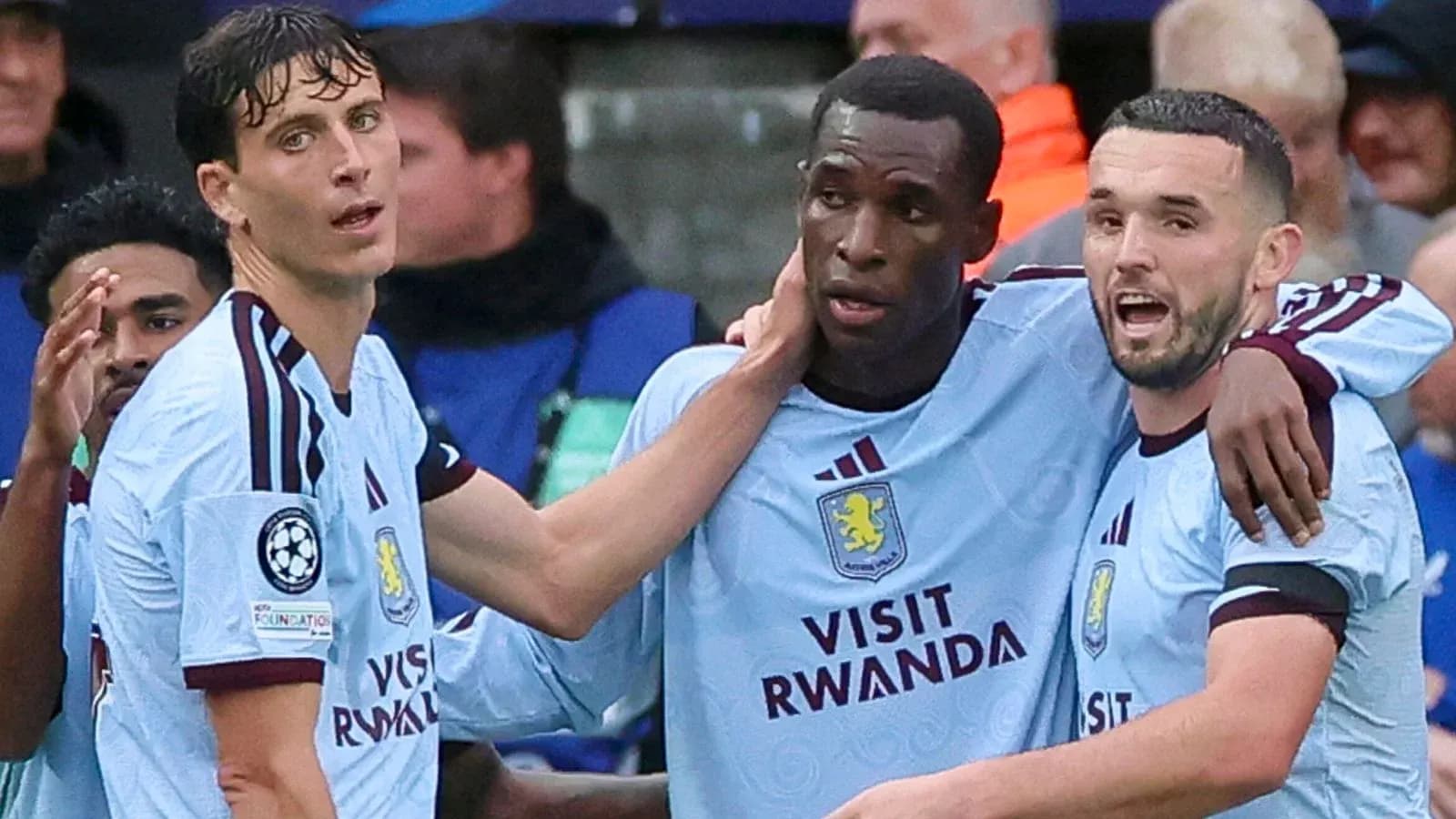 Aston Villa players celebrating a goal together
