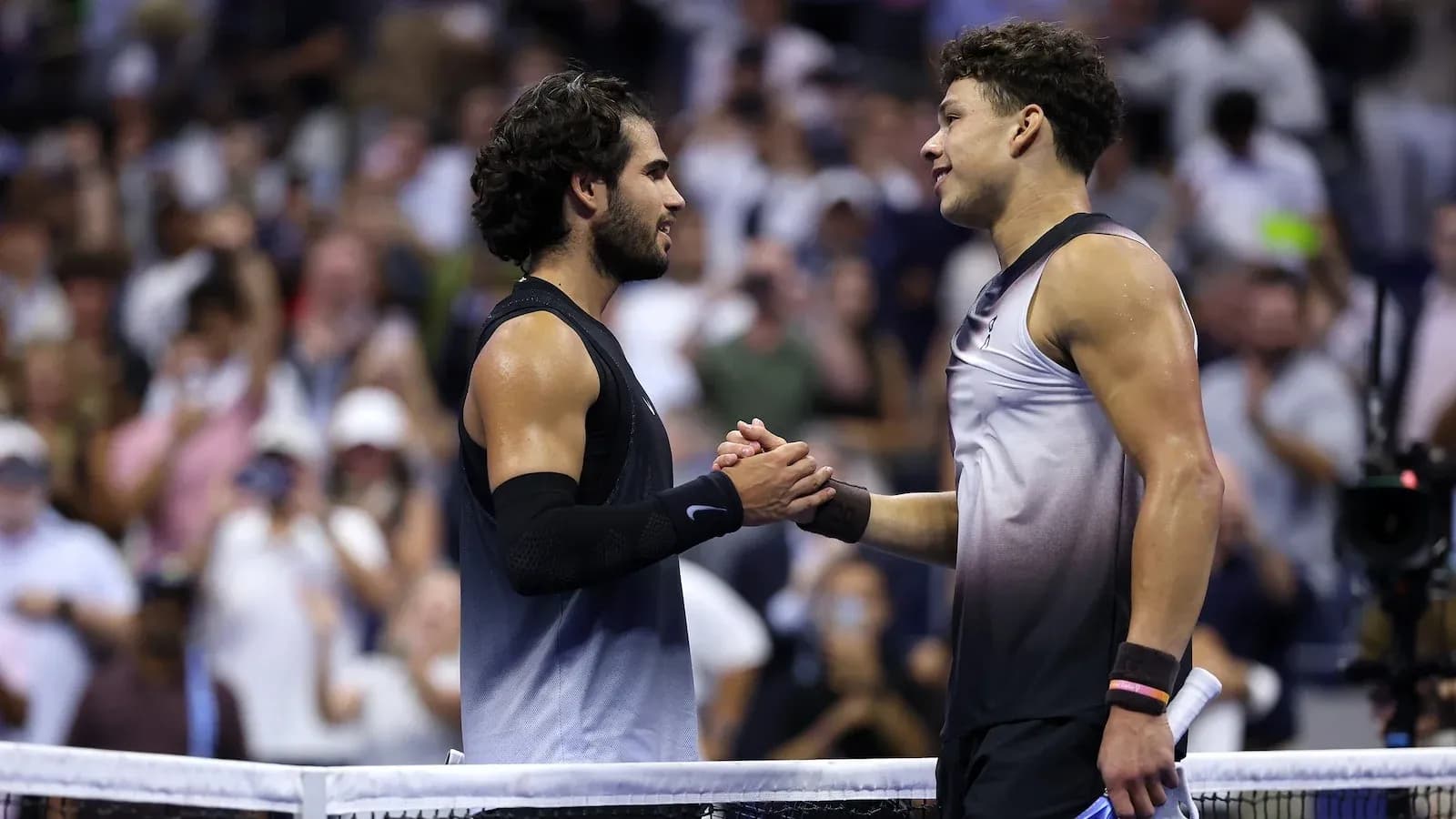 Players shaking hands after a tennis match