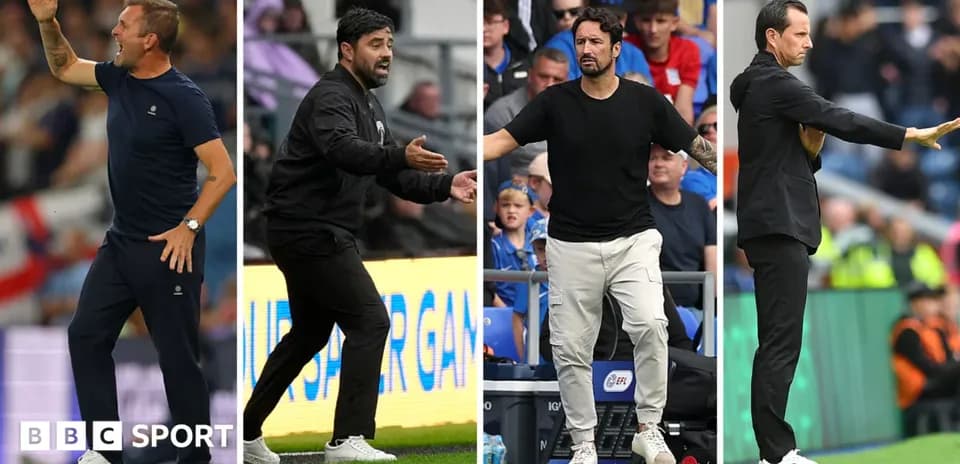 Four football managers giving instructions on sidelines