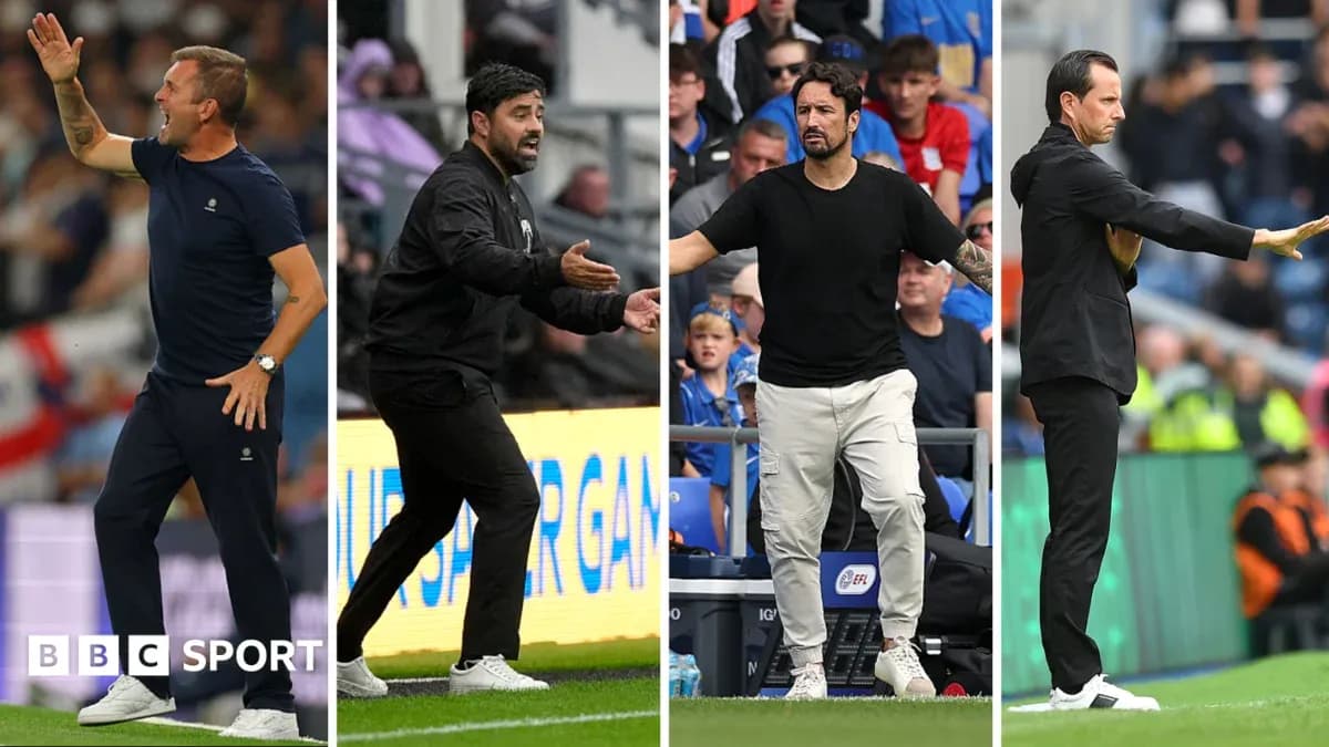 Four football managers giving instructions on sidelines