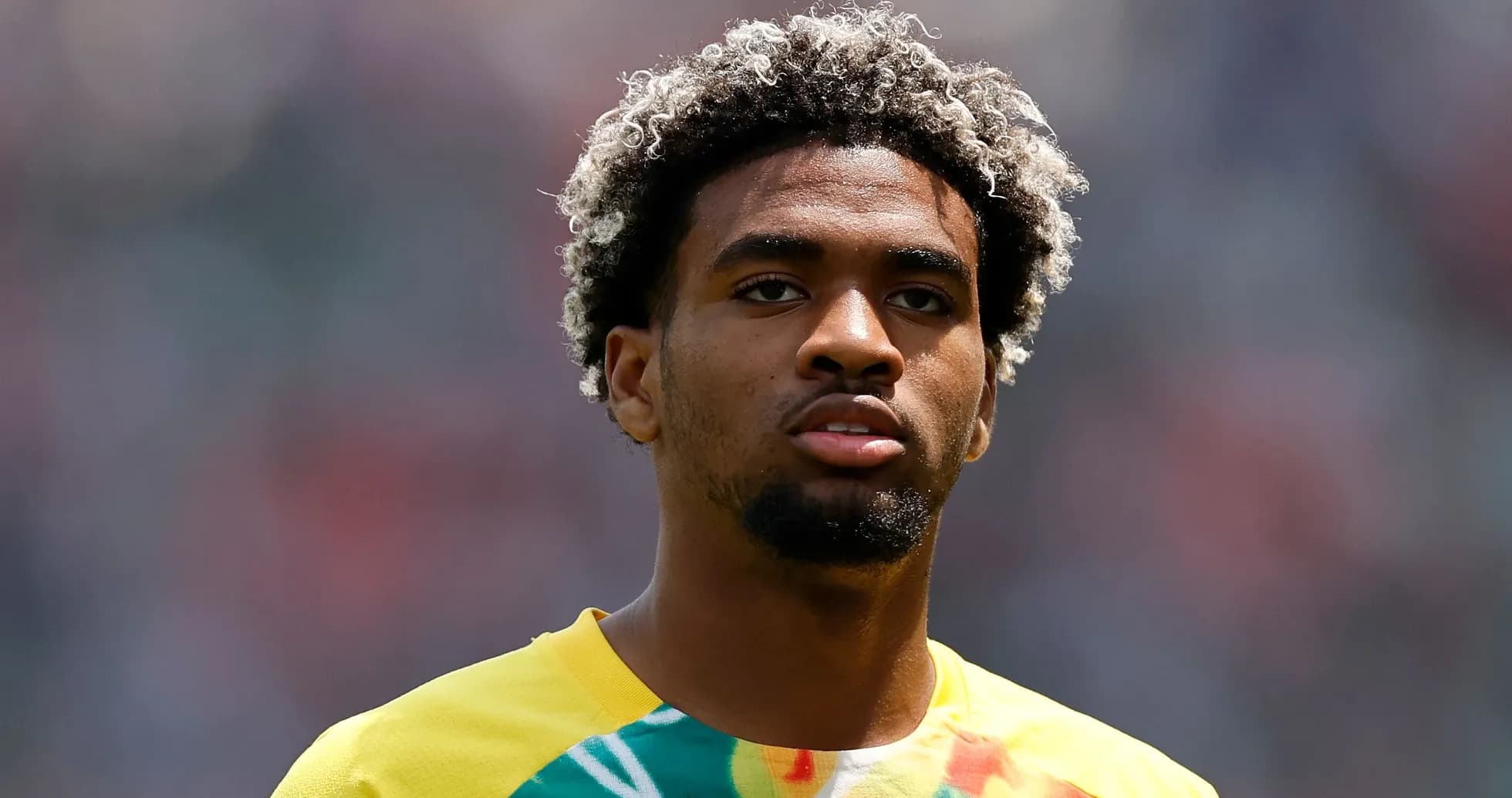 Player in colorful training shirt before match