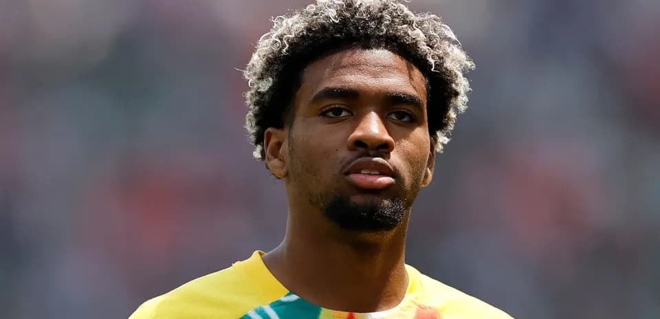 Player in colorful training shirt before match