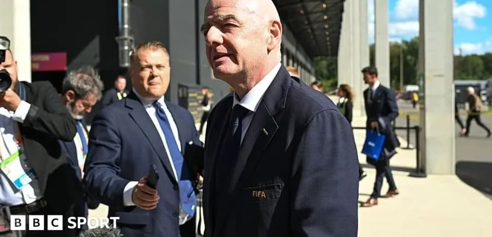 FIFA president speaking to reporters at event