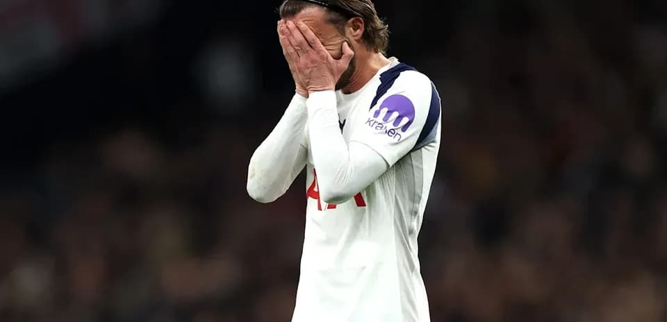 Player covering face during match disappointment