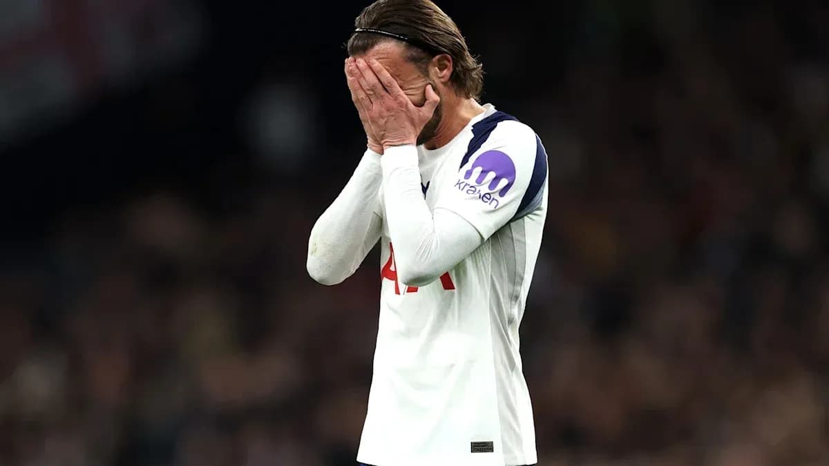 Player covering face during match disappointment