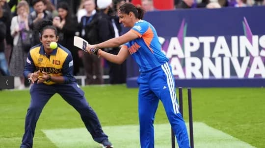 Player batting while another prepares to catch ball