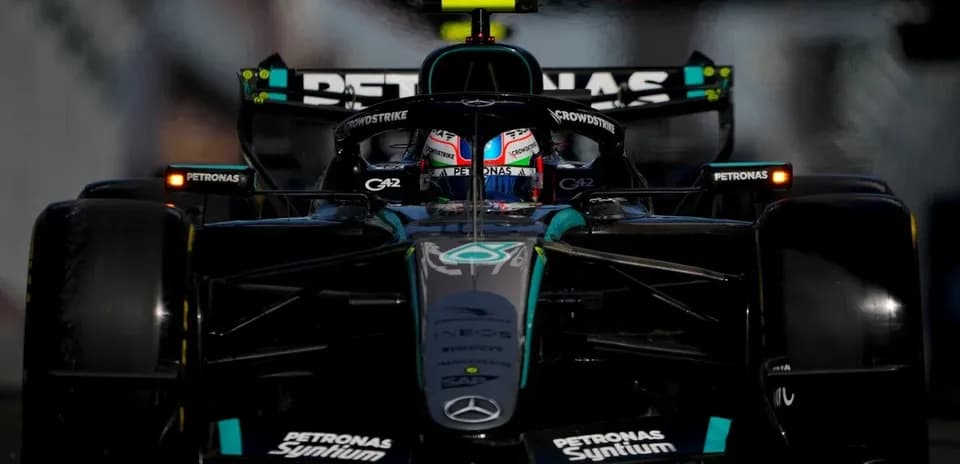 Mercedes F1 car on track during a race