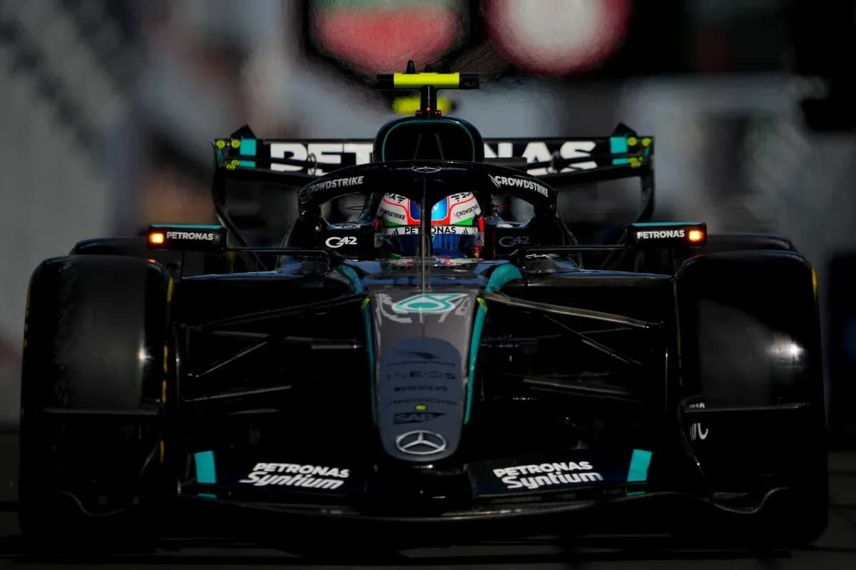 Mercedes F1 car on track during a race