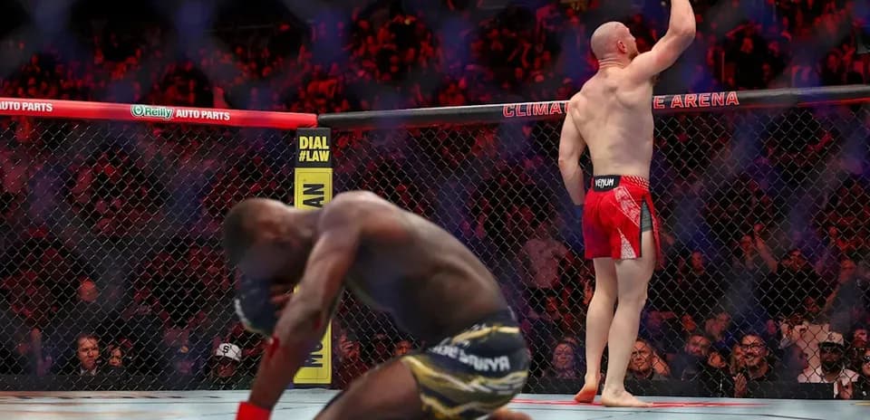 Joe Pyfer celebrating victory in the octagon